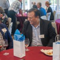 faculty laughing together